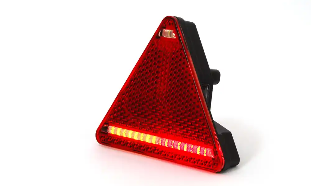 Oferta limitowana Tylna lampa zespolona (Trójkąt) Pozycja/Stop/Przeciwmgielna/Kierunkowskaz/Odblask 12/24V (Lewa) W68L